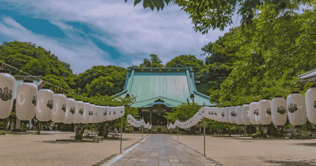 Two rows of paper lanterns lining Komyoji Temple’s approach, waiting for the evening festival.