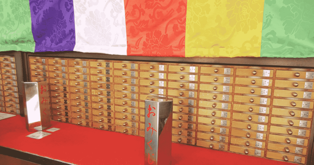 Outdoor omikuji fortune stands on the grounds of Sensoji Temple