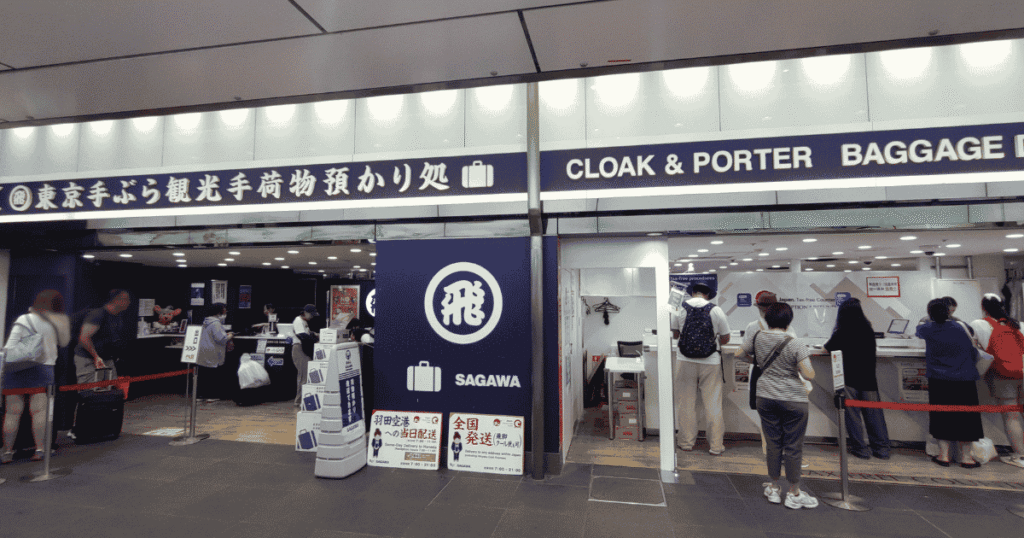 Entrance of the Sagawa Express Tokyo Service Center at Tokyo Station, featuring a counter for temporary luggage storage and delivery services.